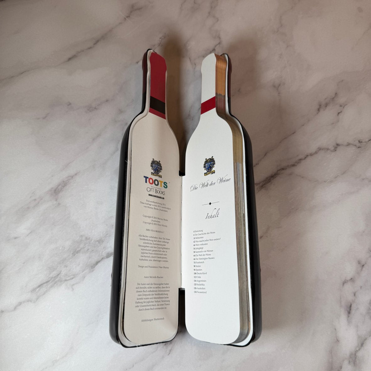 Fotofol_Die Welt der Weine | Buch in Weinflaschenform