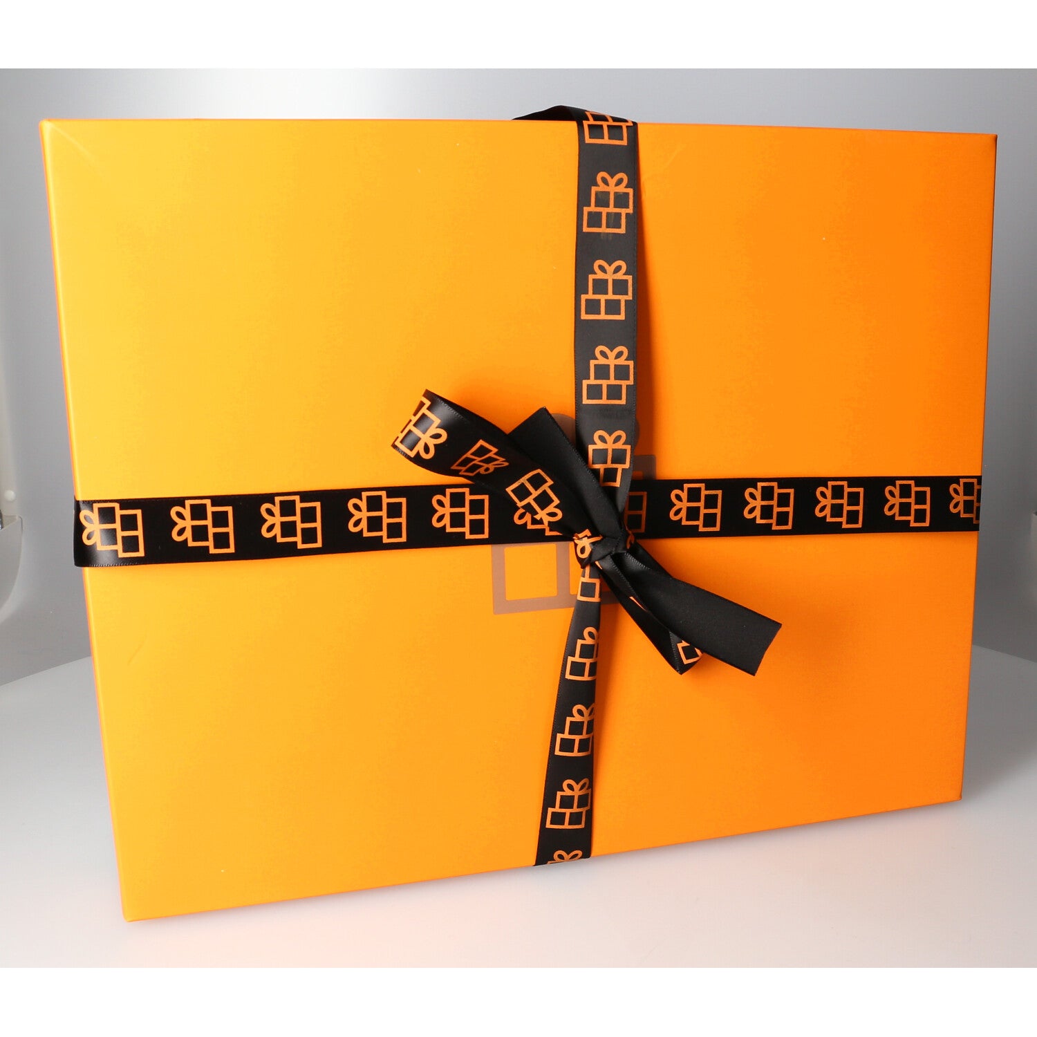 Restposten Geschenkverpackung in Orange mit schwarzem Band – Eleganz für besondere Anlässe - 12 Stück - FOTOFOL