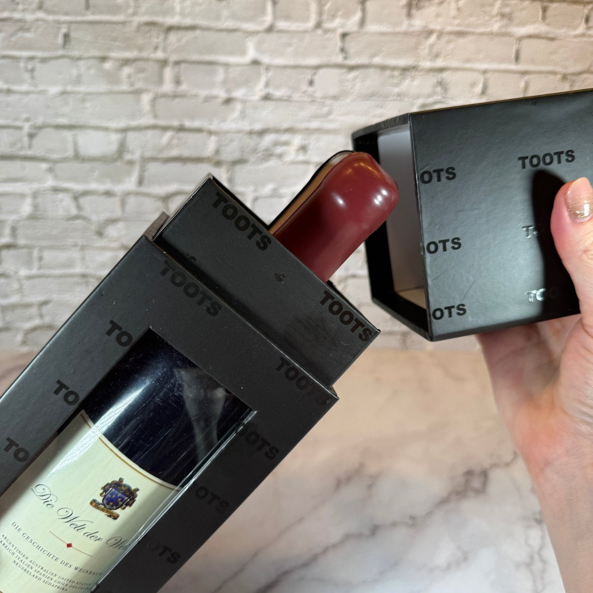 Fotofol_Die Welt der Weine | Buch in Weinflaschenform